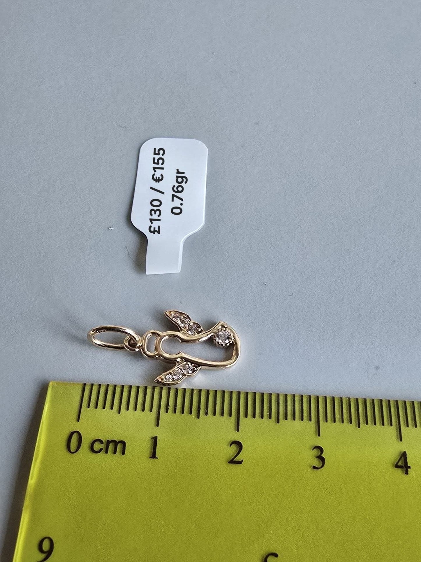 585 Gold Angel pendant. 0.76gr