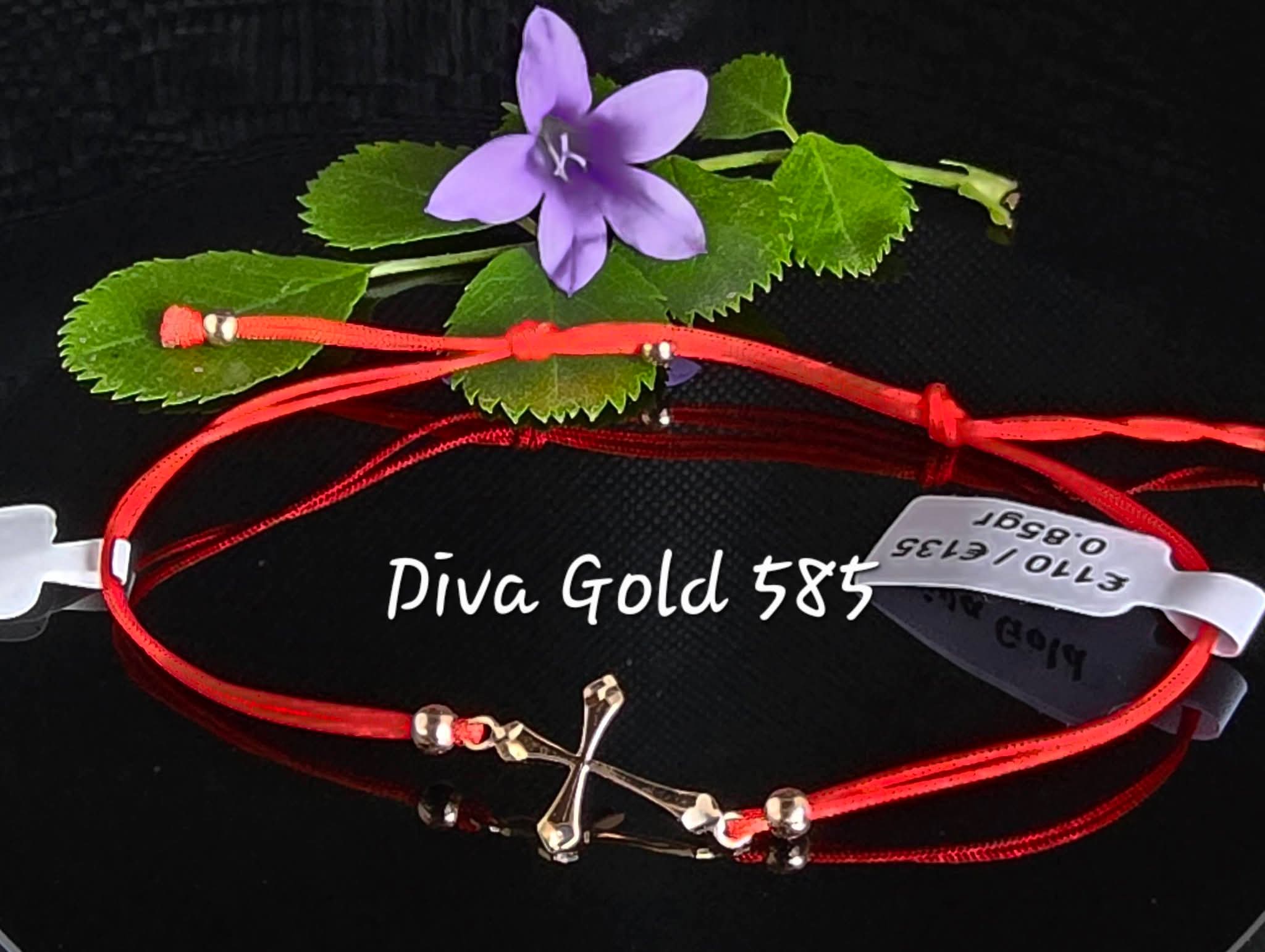 Red thread bracelet with 585 gold details. 0.85gram