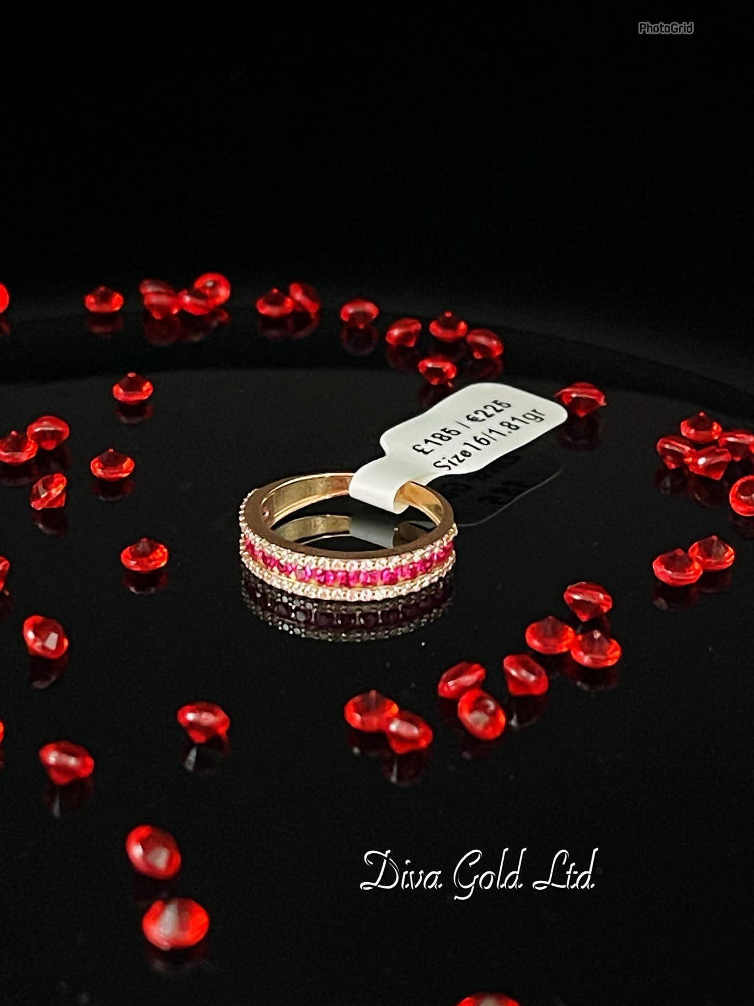 Gold ring with white & pink zircon stones.  Size 16