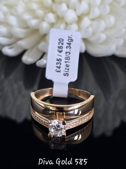 Gold women ring with white zircon stones. Size 18