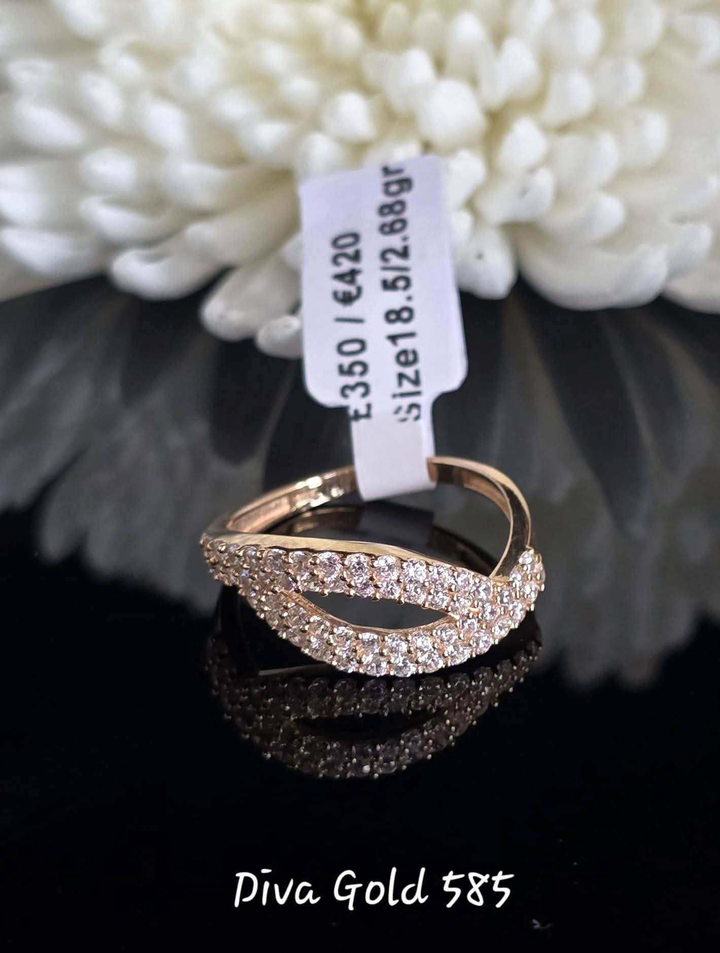Gold women Ring with white zircon stones.  Size 18.5