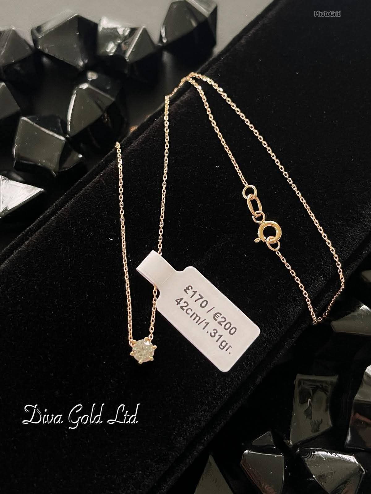 Gold Chain with pendant. 42cm