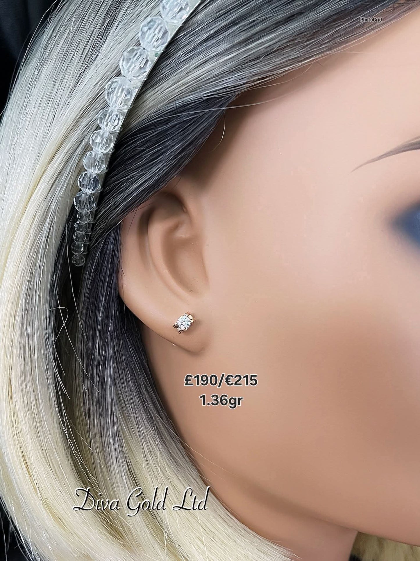 Stud gold earrings. White zircon stones