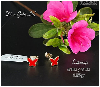 Stud gold earrings.