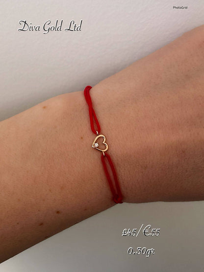 red thread bracelet with heart. 0.30 gram