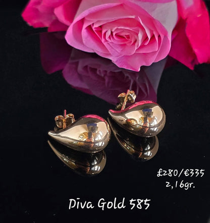 Stud drop gold earrings.