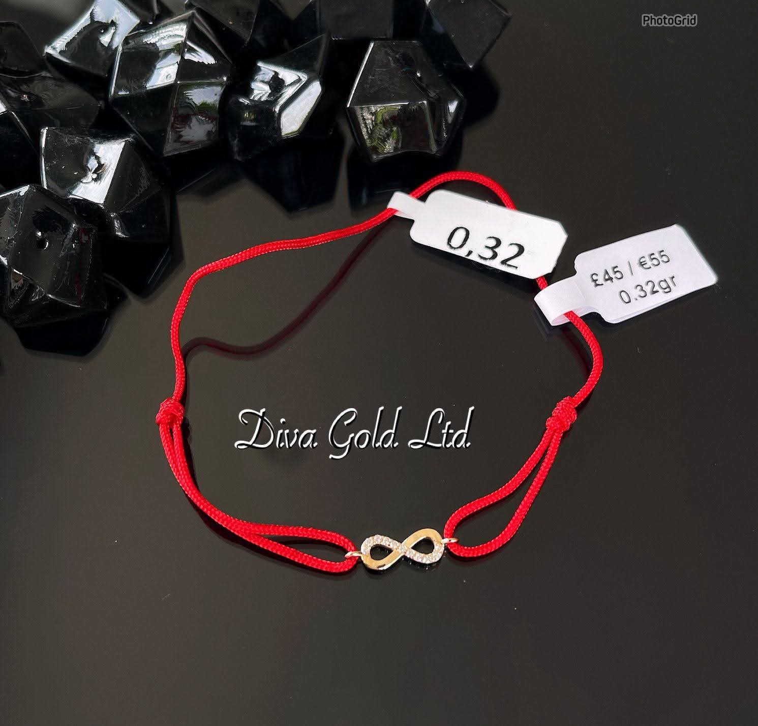 Red thread bracelet with 585 gold details. 0.32gram