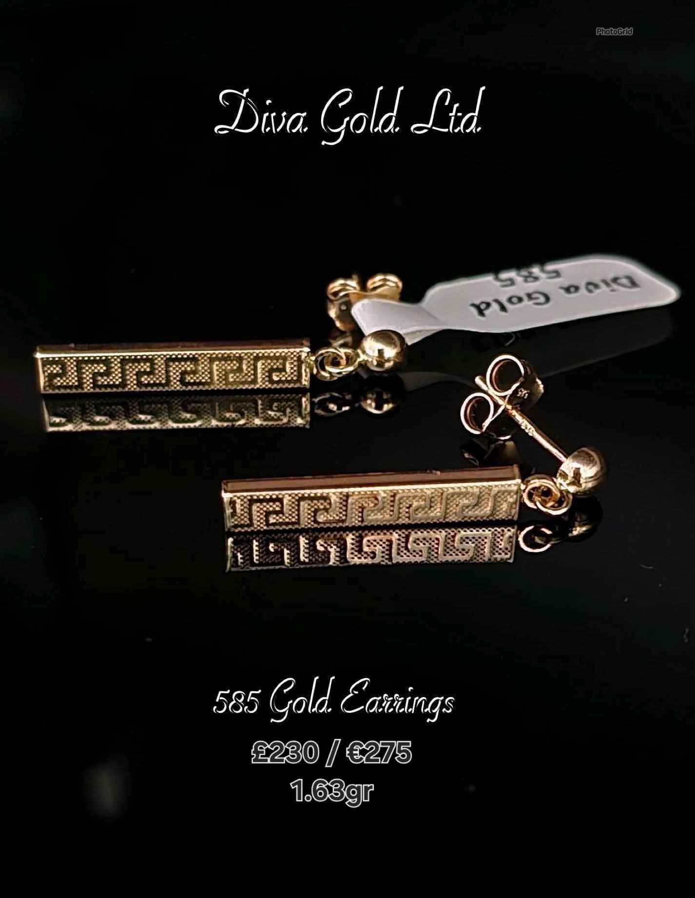 Stud gold earrings.
