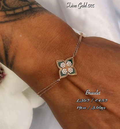 Gold bracelet with white zircon stones. 19cm