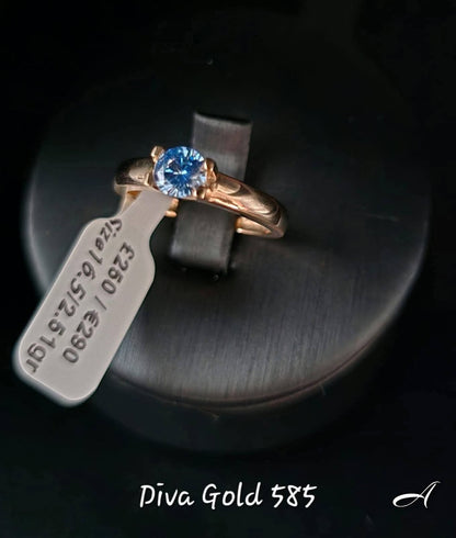 Gold ring with blue zircon stone. Size 16.5