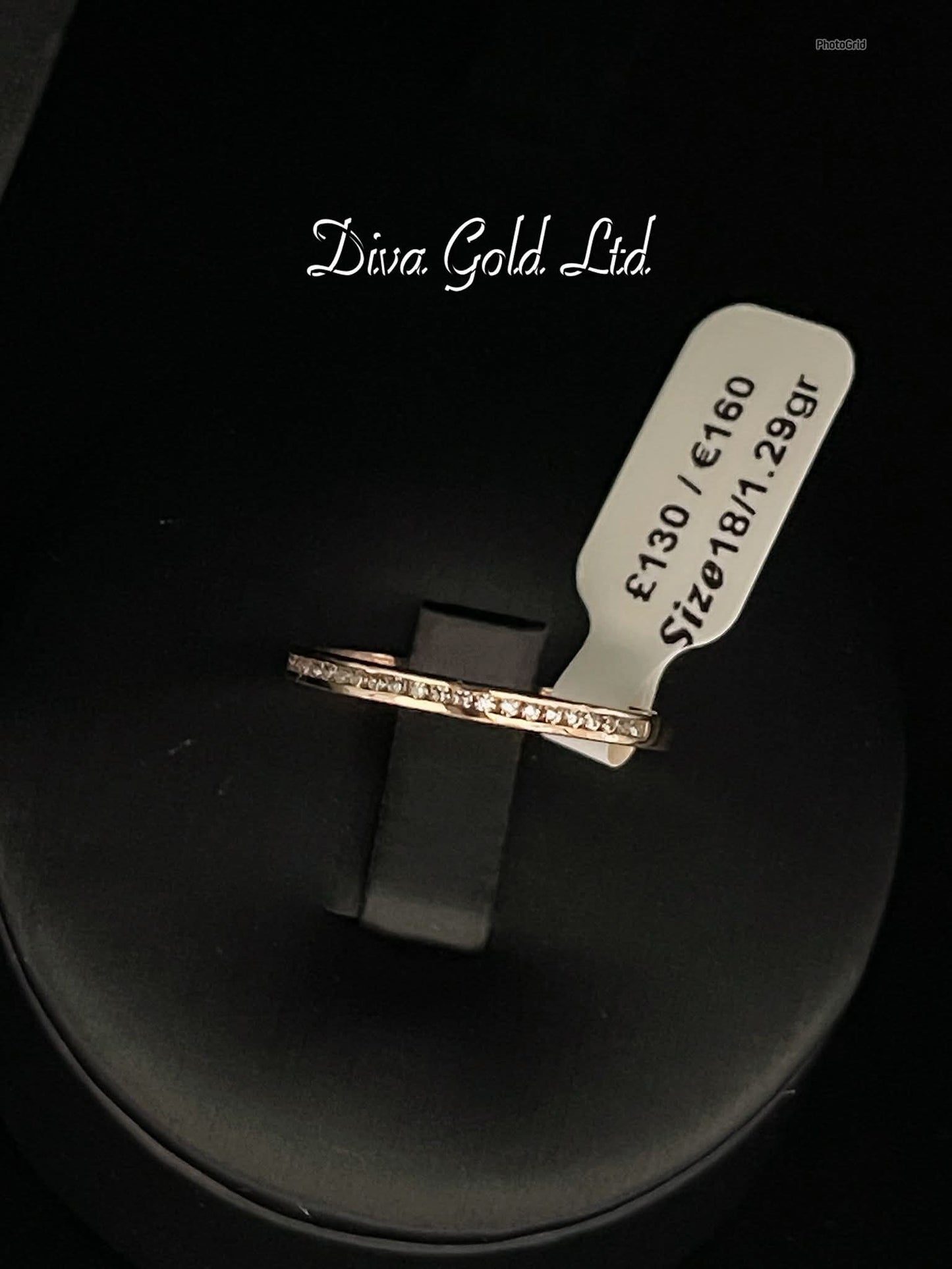 Gold ring with zircon stones. Size 18