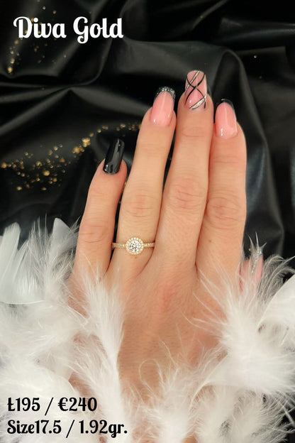 Gold ring with white zircon stones. Size 17.5